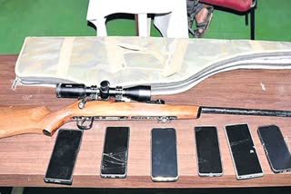 Licensed gun and mobile phones recovered after killing of 20 stray dogs in Telangana