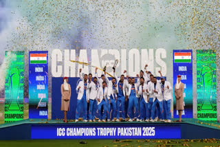 India's players celebrate after winning the ICC Champions Trophy final