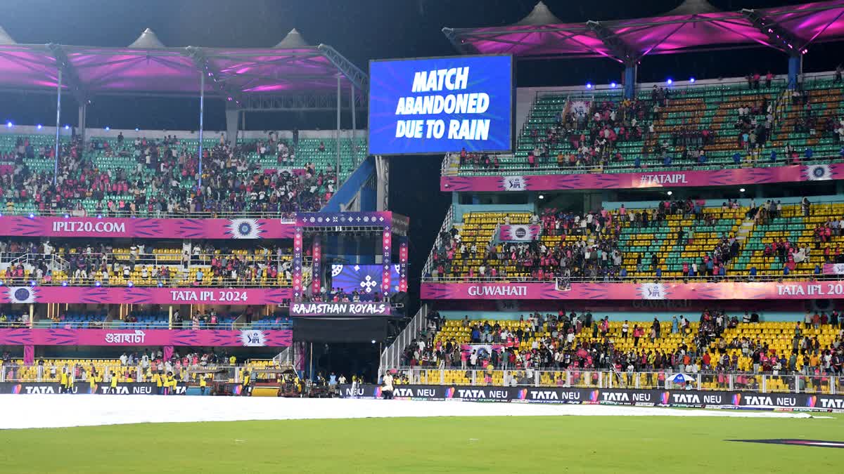 Spectators empty the Assam Cricket Stadium in Guwahati after KKR vs RR match of IPL 2024 is abandoned on Sunday May 19, 2024