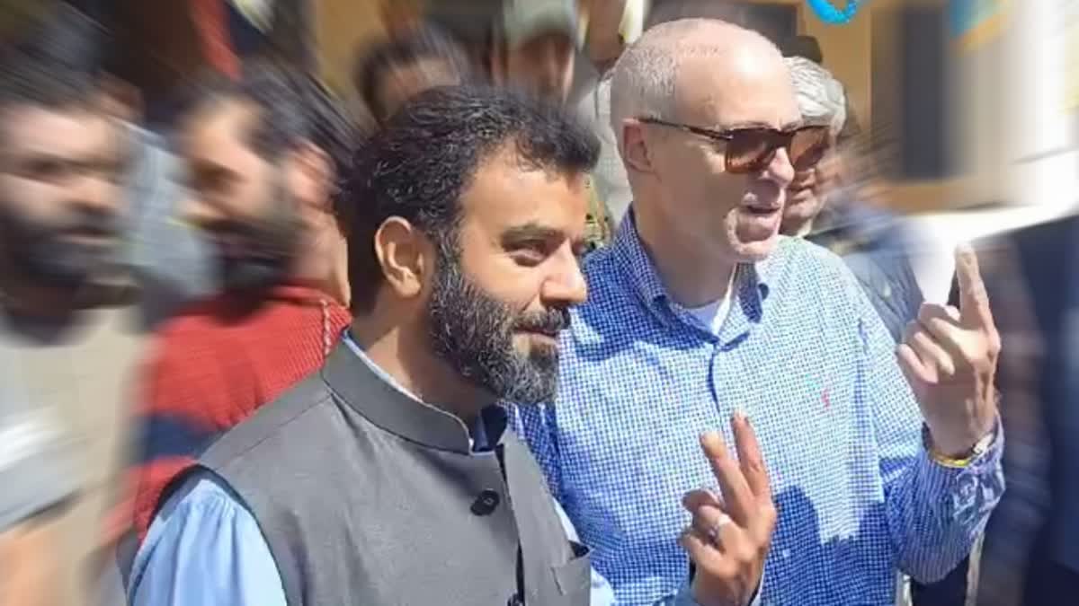 Omar Abdullah (R) alongside fellow party leader Agha Ruhullah Mehdi during thier visit to Budgam  during fifth phase of Lok Sabha election  on Monday May 20, 2024