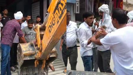 ENCROACHMENT BULLDOZED OUTSIDE SHOP