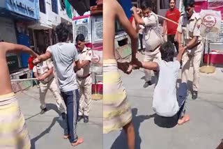 Video of Policemen beating Youth