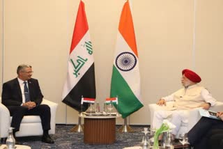 Puri in discussion with Deputy PM of Iraq