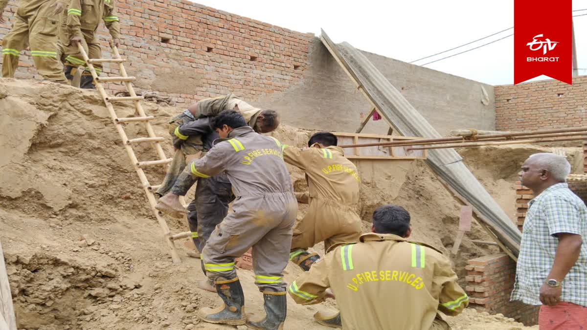 एसटीपी के गड्ढे में दबे मजदूरों का रेस्क्यू करती टीम.