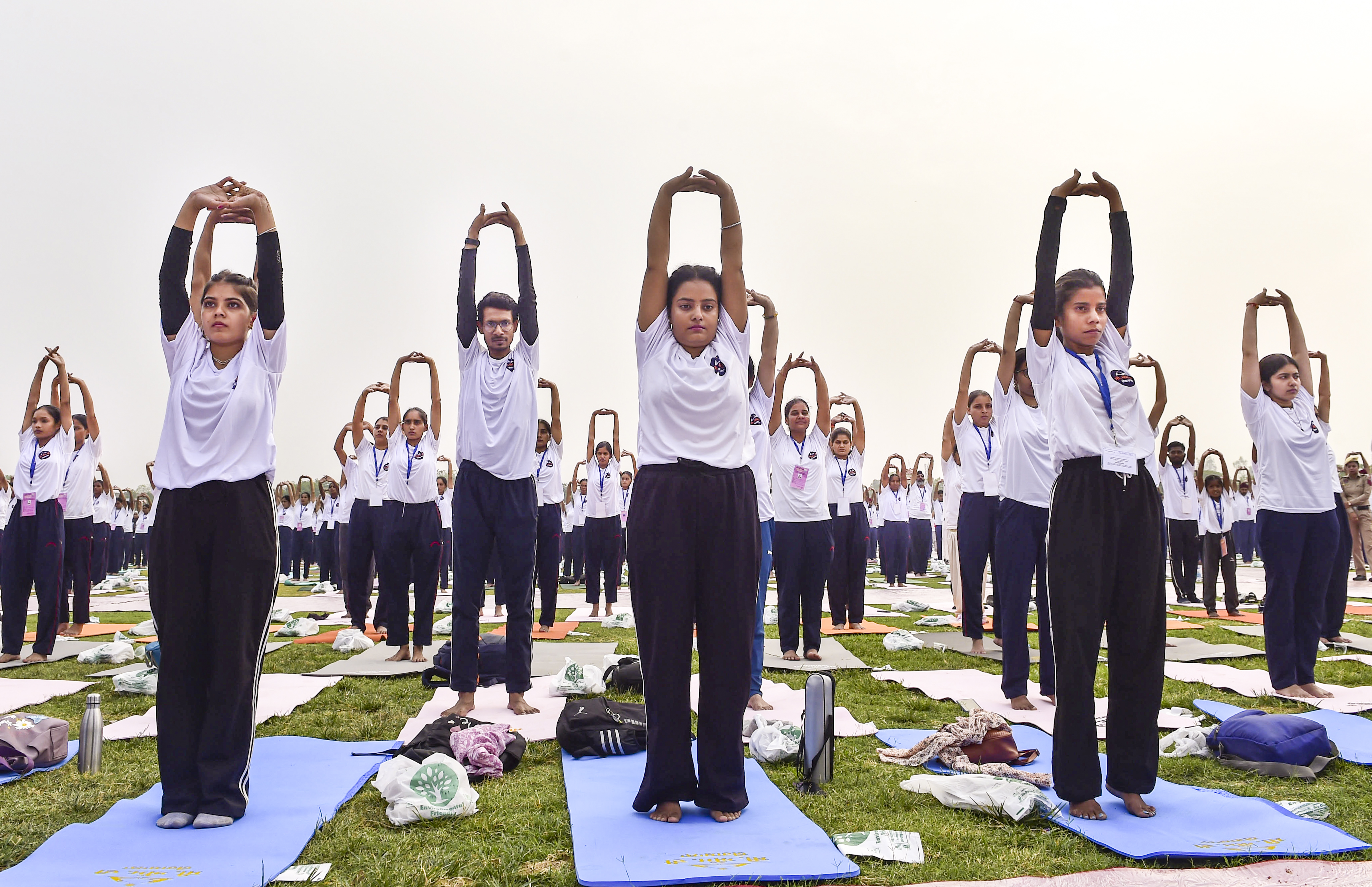 People take part in a yoga session ahead of International Yoga Day, at Punjab Armed Police (PAP) campus in Jalandhar, Punjab, Thursday, June 19, 2025.