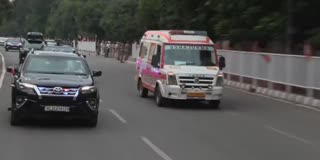 PRIME MINISTER GIVES WAY TO AMBULANCE