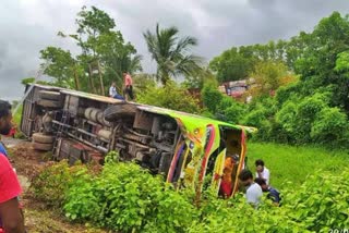 bus overturns near a petrol pump