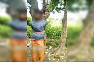 boy tied with tree and thrashed