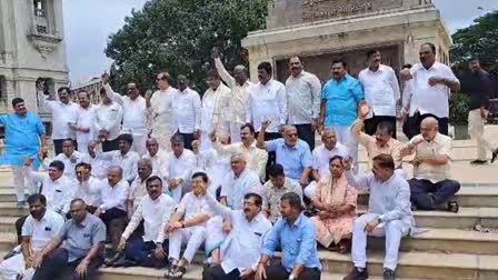 Protest by BJP members infront of Gandhi statue