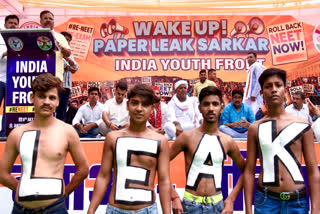 Indian Youth Congress workers stage a protest against the central government over irregularities in NEET in New Delhi on July 8.