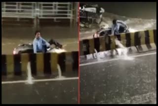 Biker_Washed_Away_In_Hyderabad_Rain_Flood