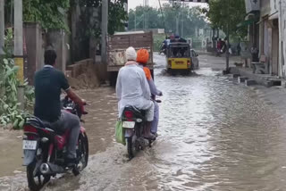 The contaminated sewage water is standing on the road due to non-emission in Mansa