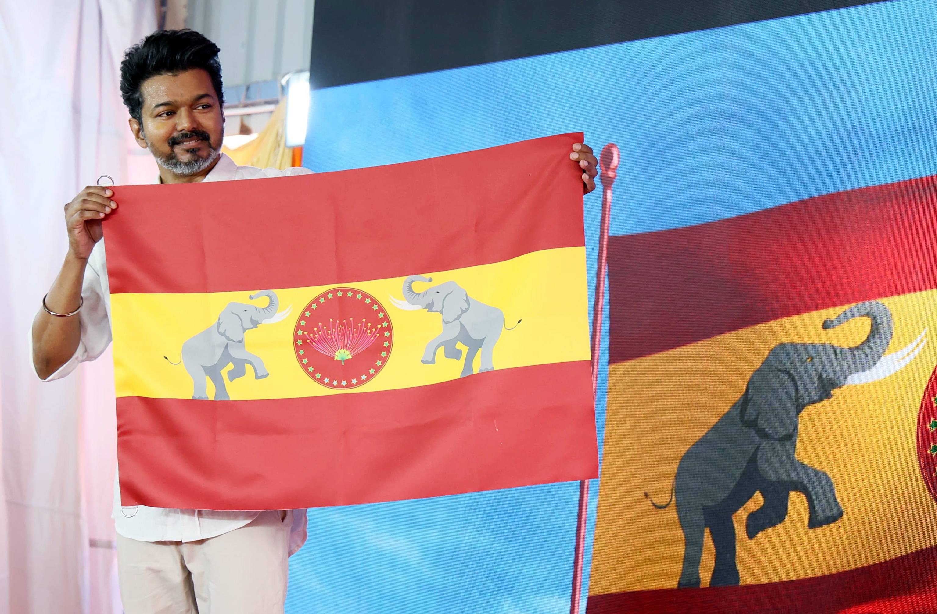 File photo of actor Vijay unveiling the flag of Tamizhaga Vetri Kazhagam