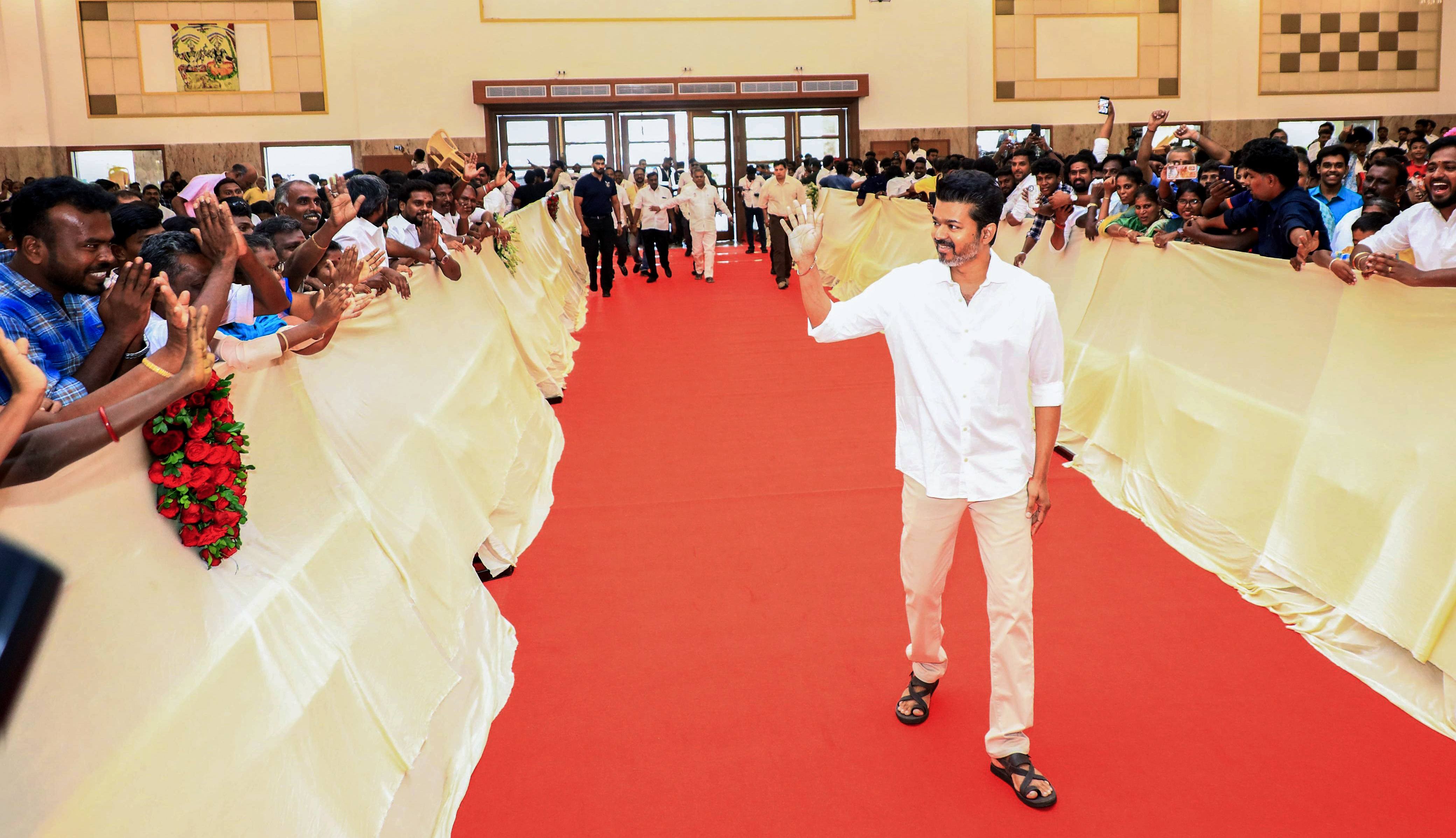 File photo of actor Vijay acknowledges his supporters at an event