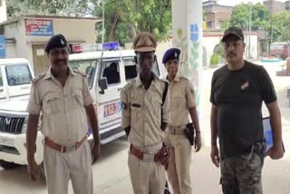 The accused (in the middle) Mithlesh Maji after arrest