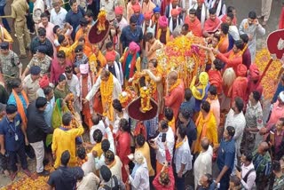 Priests and devotees during the procession