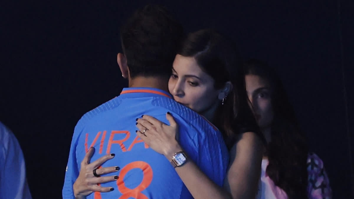 Anushka Sharma hugs Virat Kohli