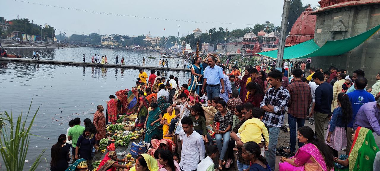 Arghya to rising sun on banks of Shipra