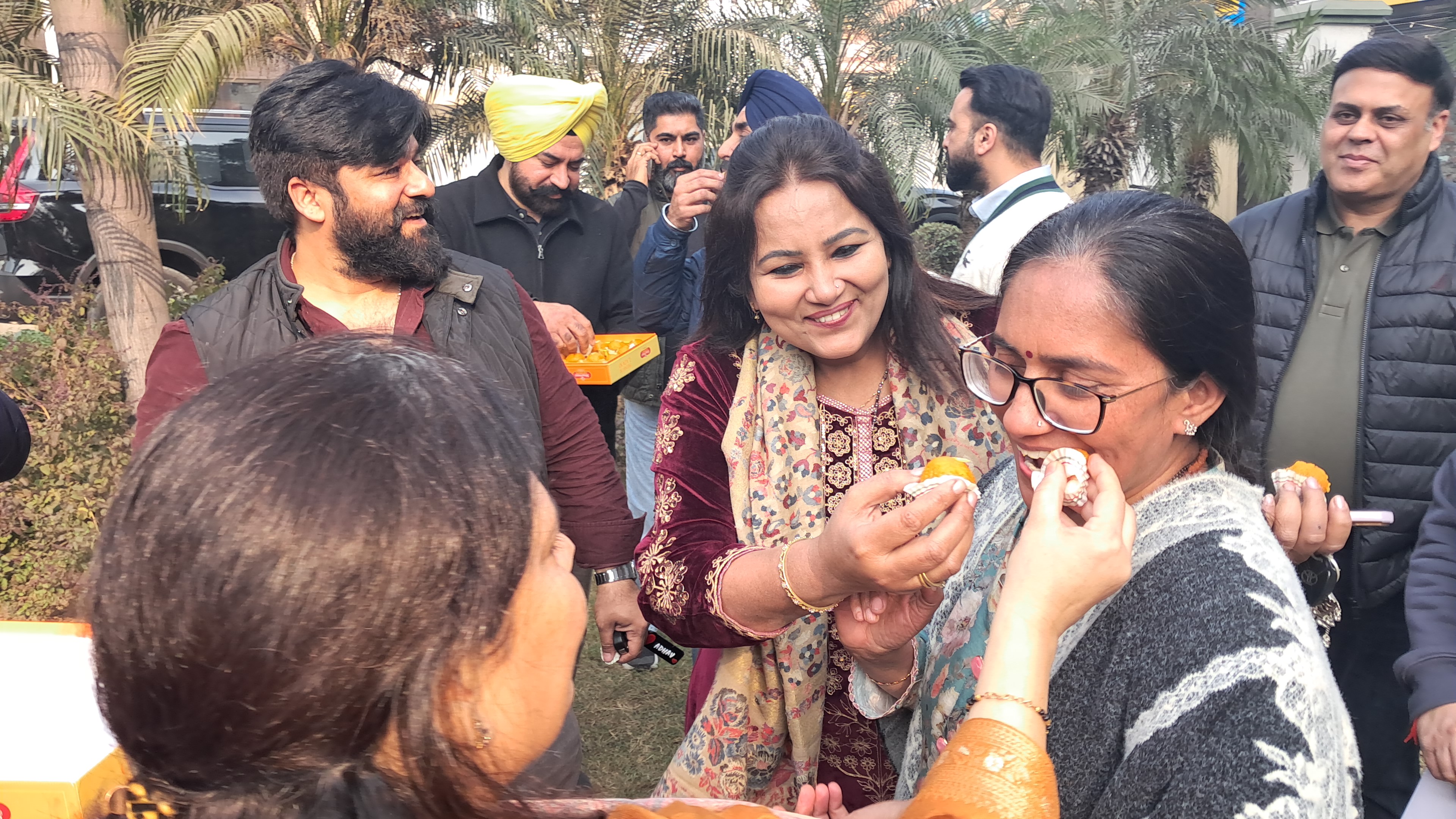 bail granted before corporation elections, wife distributes sweets in celebration