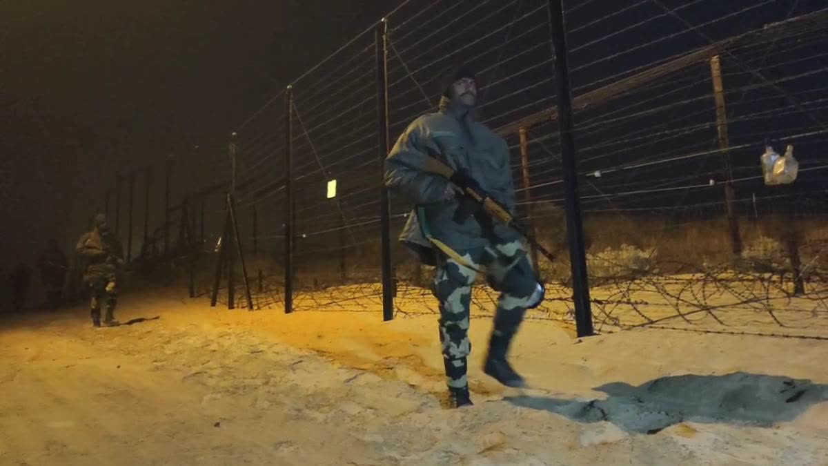 BSF jawans patrol at the international border in Barmer