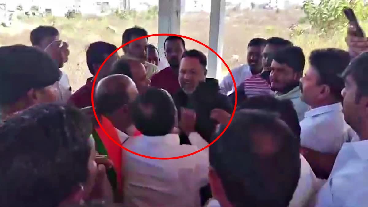 BJP MP Etala Beats Up Land Grabber In Pocharam