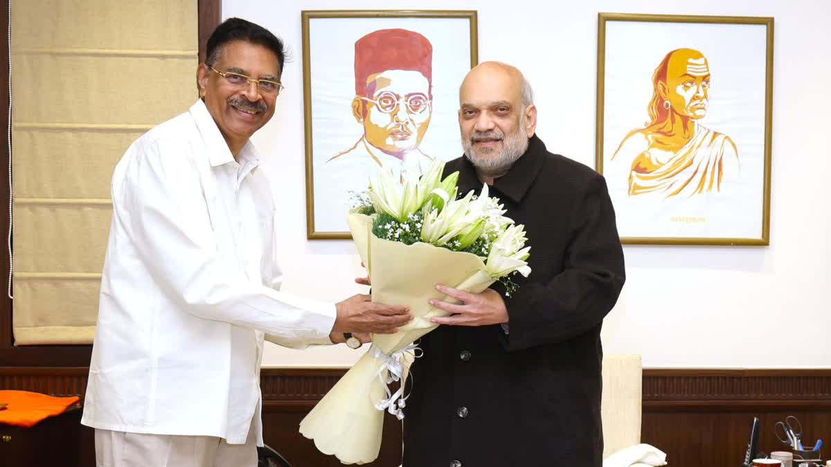 Odisha Governor Hari Babu (Left) meets Amit Shah in Delhi.