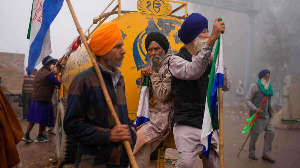 Police fired tear gas at farmers who resumed their protest march to New Delhi on Feb 21 (AP Photo)