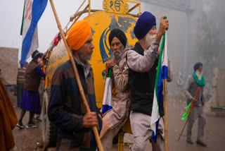 Police fired tear gas at farmers who resumed their protest march to New Delhi on Feb 21 (AP Photo)