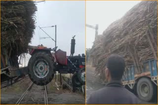 tractor trolley stuck at railway track