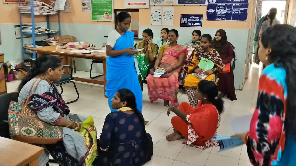 Pregnant women sitting on the floor