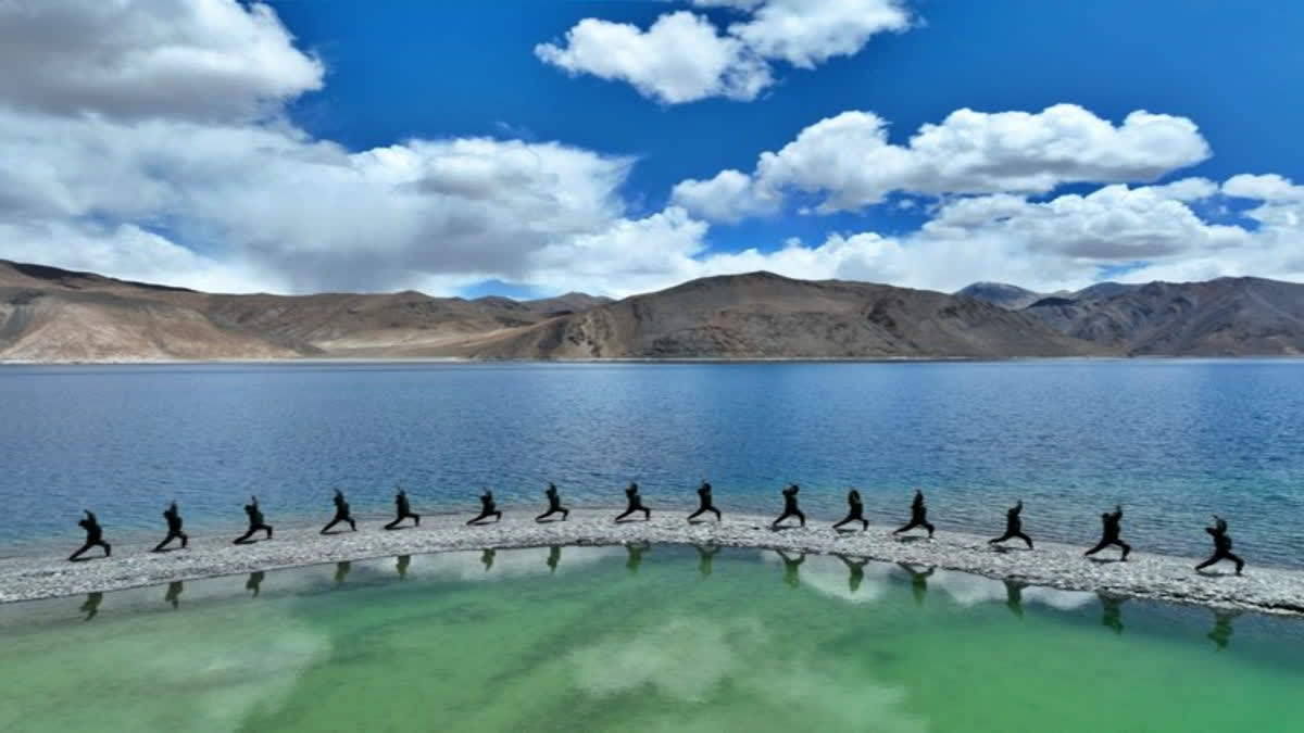 Indian Army personnel perform Yoga at Ladakh's Pangong Tso Lake