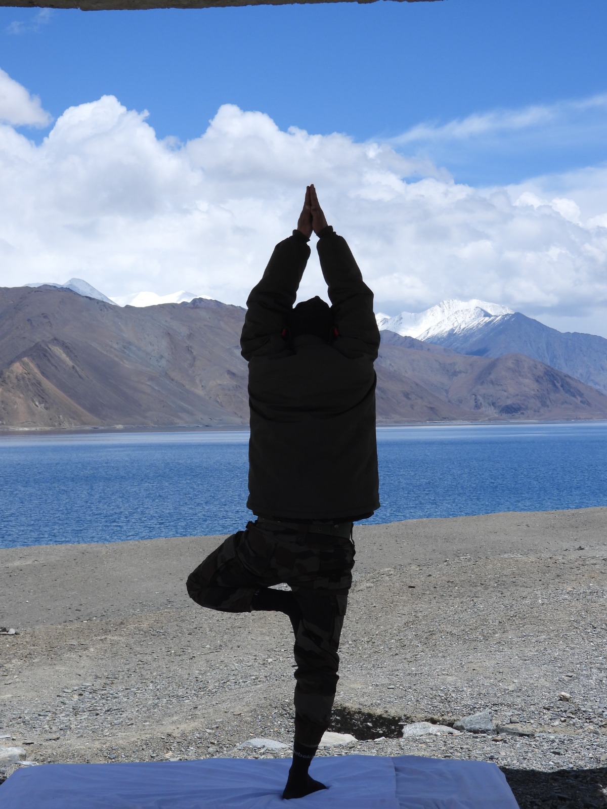 Indian Army personnel perform Yoga at Ladakh's Pangong Tso Lake