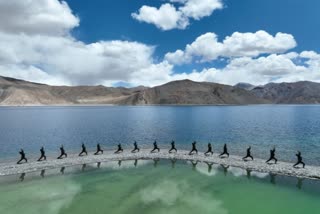 Indian Army personnel perform Yoga at Ladakh's Pangong Tso Lake