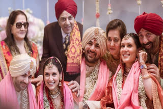 Actor Dharmendra posed for a photo with his first wife at his grandson's wedding