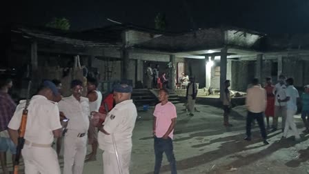 Policemen on standby outside the residence of a man who shot dead his toddler daughter in Bihar's Purnia on Thursday June 20, 2024