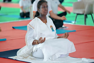 President Droupadi Murmu participates at a yoga session in Dehradun on Saturday.