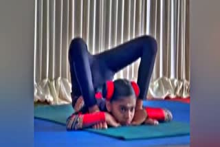 YOGA GUINNESS RECORD KERALA  KHANDBHERUNDASANA  YOGA DAY  ഉമ ജിഞ്ചു ഖണ്ഡഭേരൂണ്ടാസനം