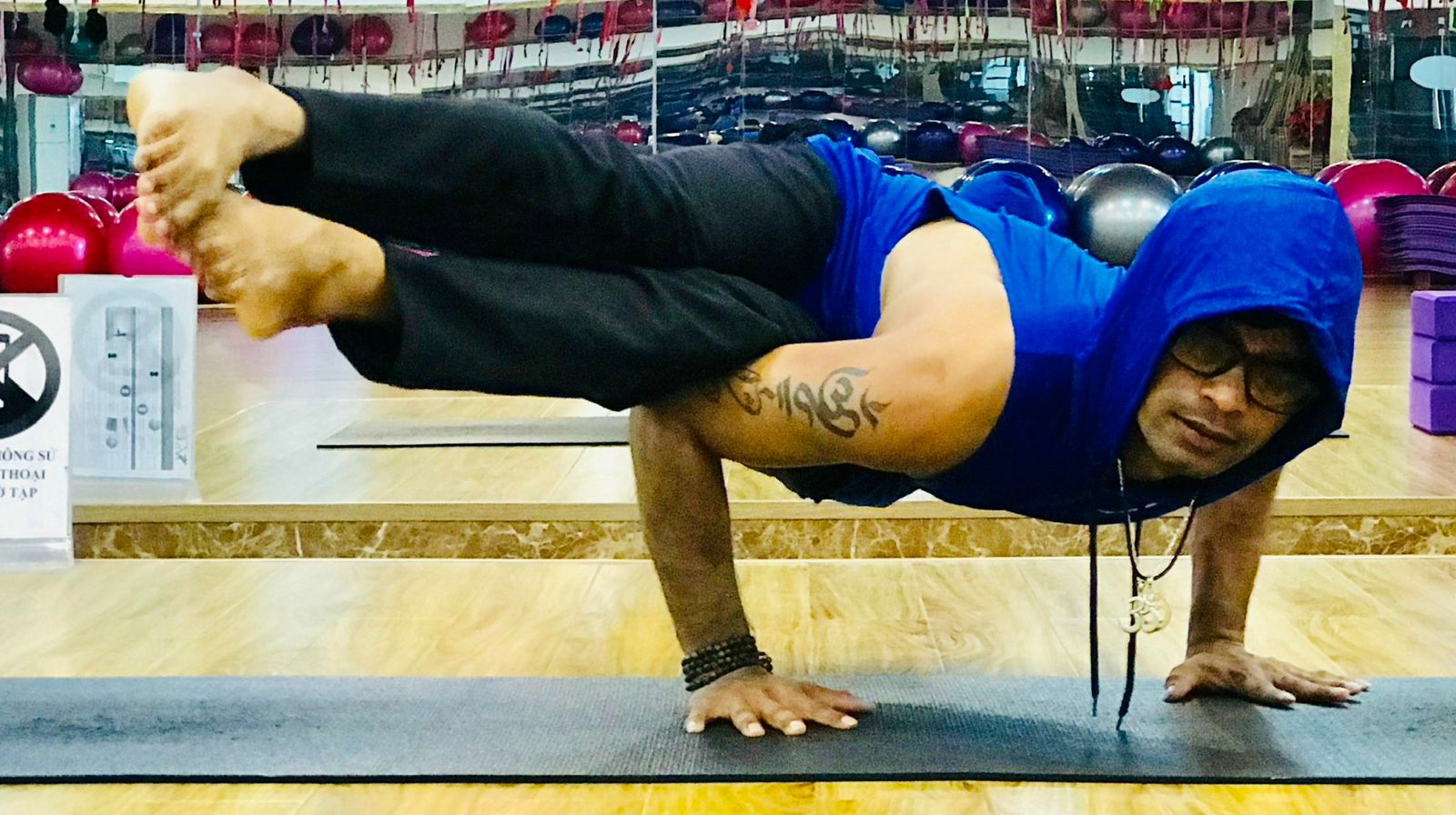A man performs yoga in Vietnam