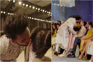 Ranveer Singh made a spectacular entry at Manish Malhotra's The Bridal Couture Show. During the event, he took a dramatic pause to plant a kiss on his actor-wife Deepika Padukone.