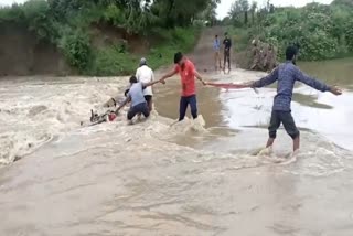 Village Secretary seen crossing culvert in Vidisha