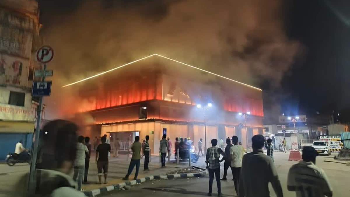 Locals outside the metro station that went up in flames