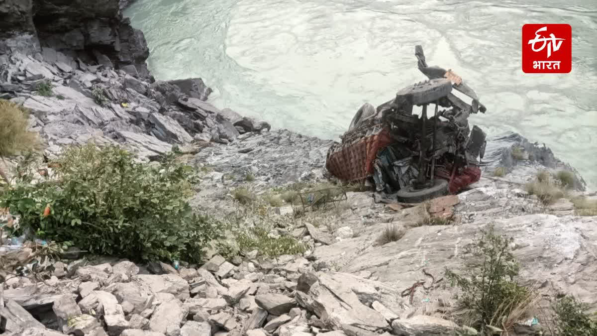 The truck’s front cabin was submerged in the river