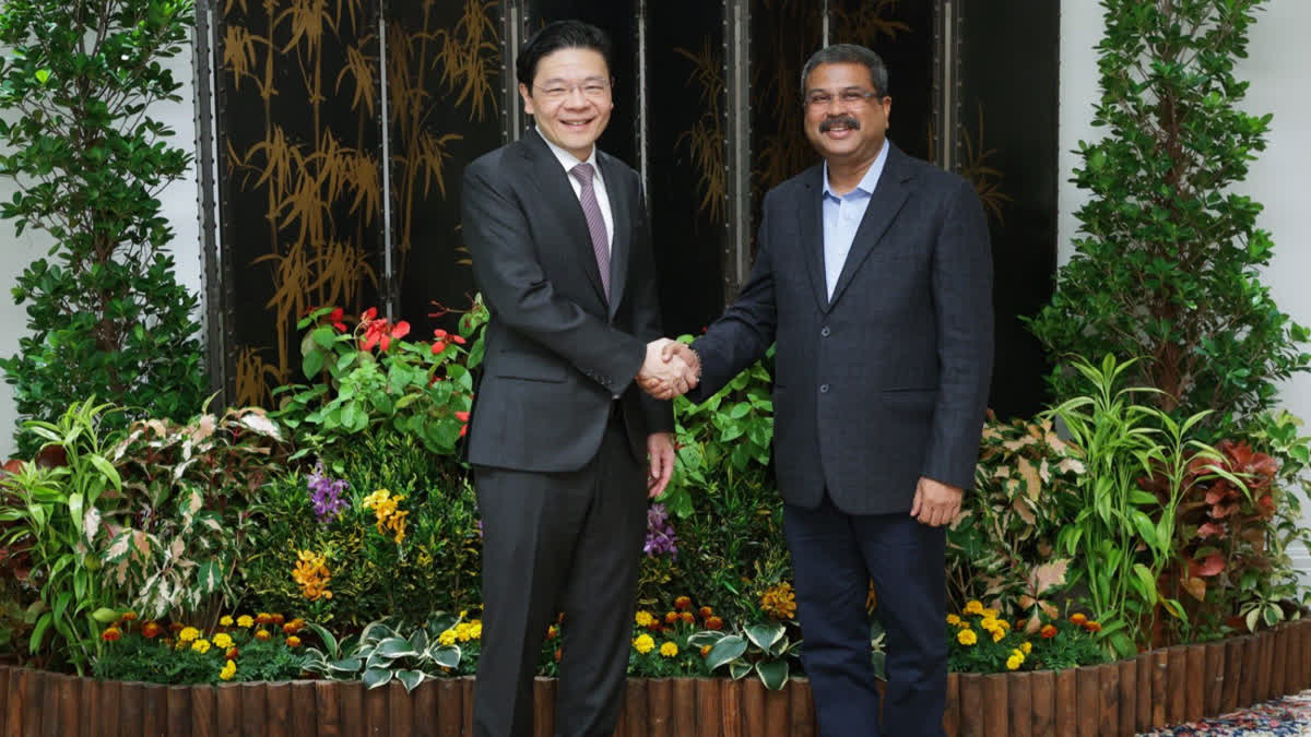 Prime Minister of Singapore Lawrence Wong (Left) and Union Minister for Education Dharmendra Pradhan (Right)