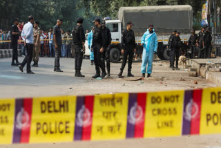 Delhi Police seized CCTV footage related to a blast outside a CRPF school, where a suspect was spotted planting explosives before the incident.