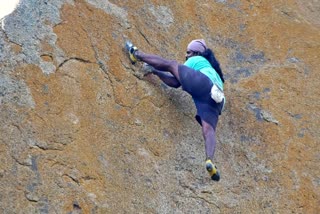 Kothiraj climbing the rock