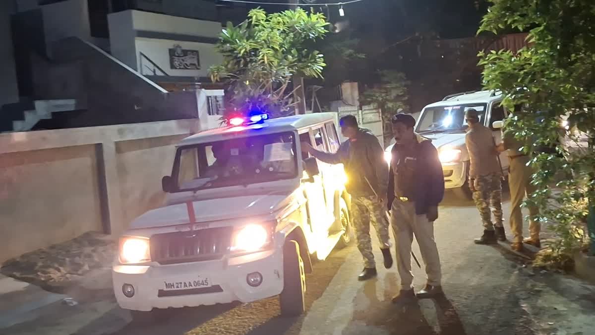 Cops on standby outside a polling booth in Maharashtra's Amravati during assembly elections 2024