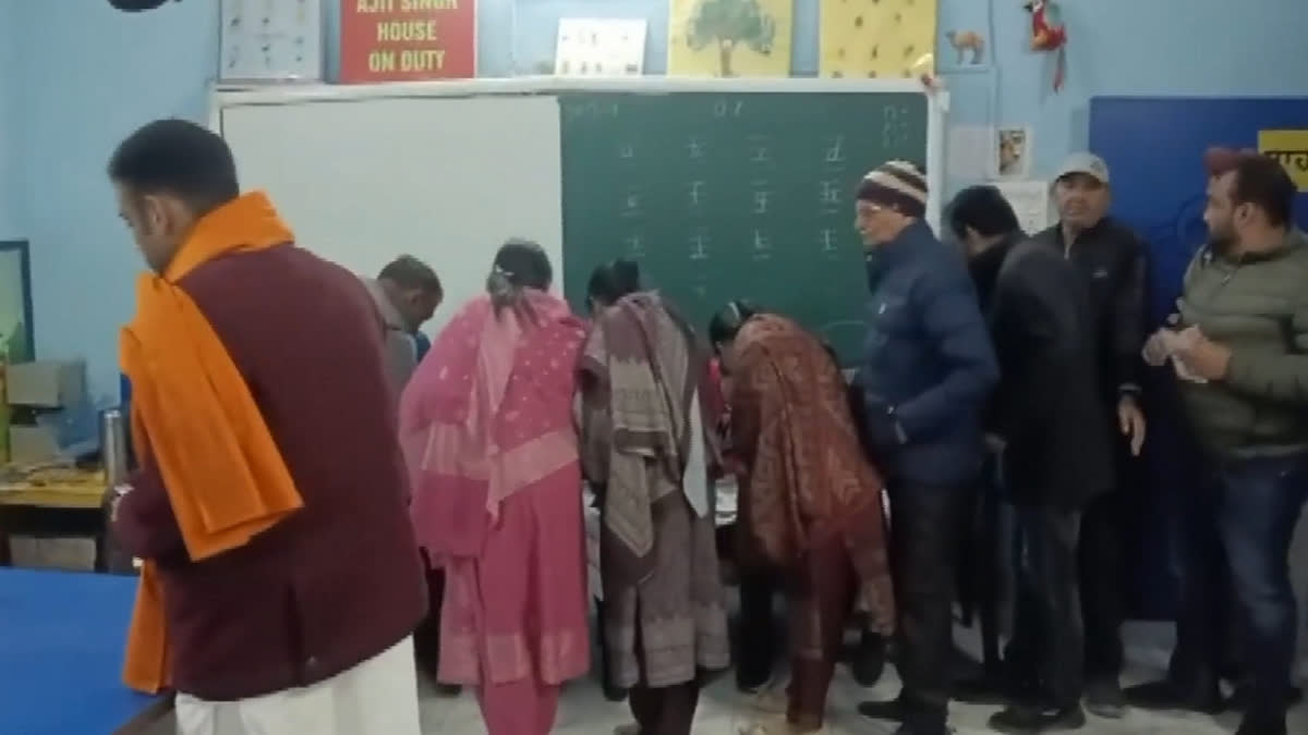 Amritsar: People arrive to vote for the Punjab municipal corporations, in Amritsar, Saturday, Dec. 21, 2024.