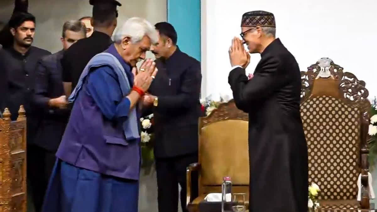 Omar Abdullah (R) greets LG Manoj Sinha after taking oath as J&K CM