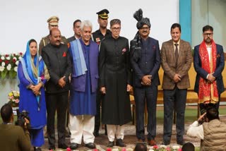 Omar Abdullah with LG Manoj Sinha and his cabinet ministers after taking oath as J&K CM