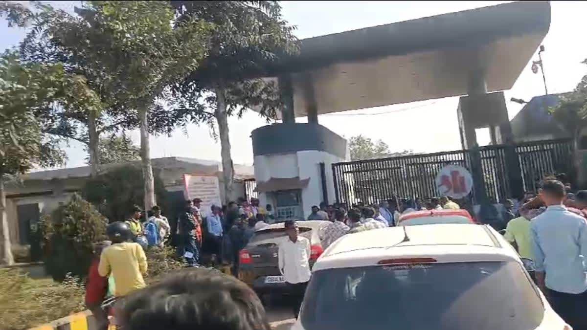 Locals protest outside the cement factory in Baloda Bazar